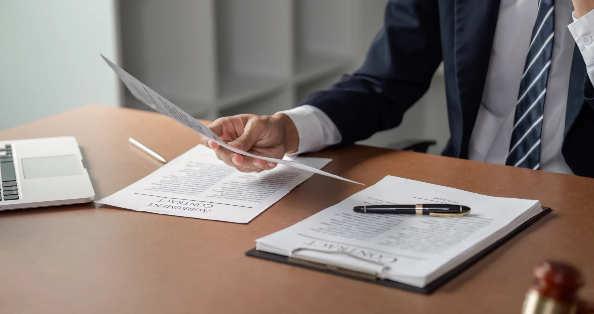 Person looking over legal documents